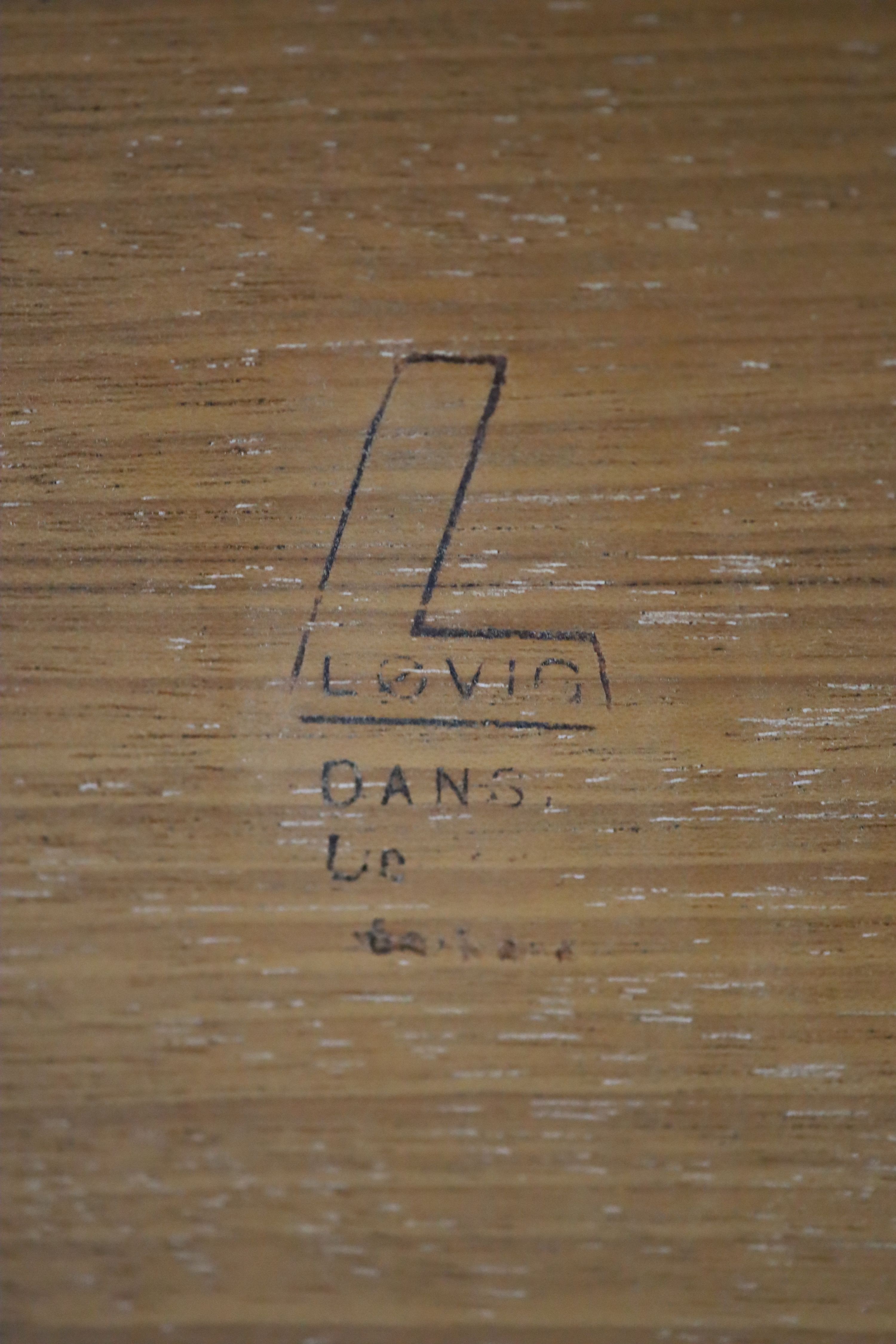 Jens Quistgaaard for Lovig, a Danish teak flip top desk circa 1973, W. 162. H. 86. D. 73 cm.